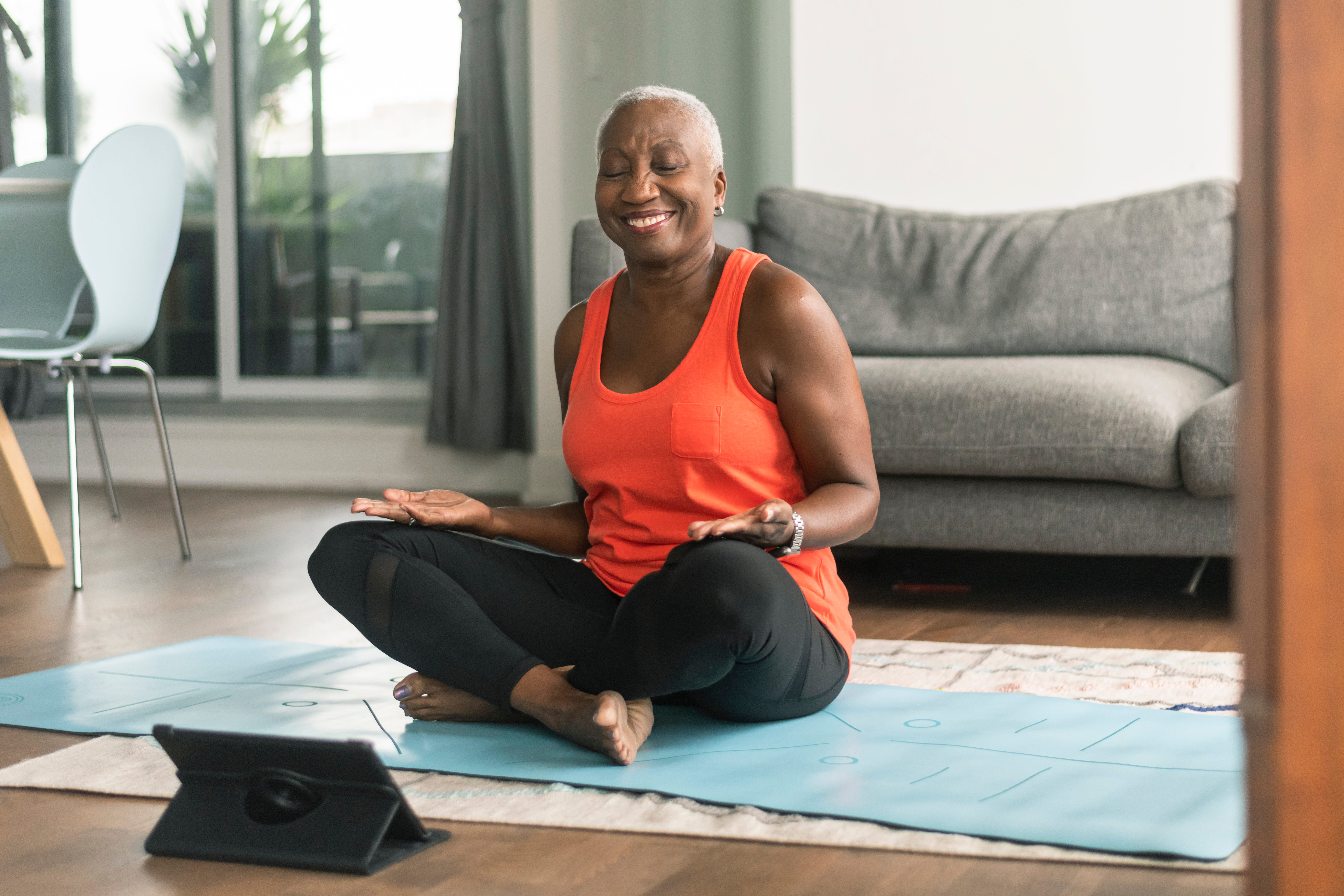 7 Stretches to Help Relieve Common Menopause Symptoms, According to Experts